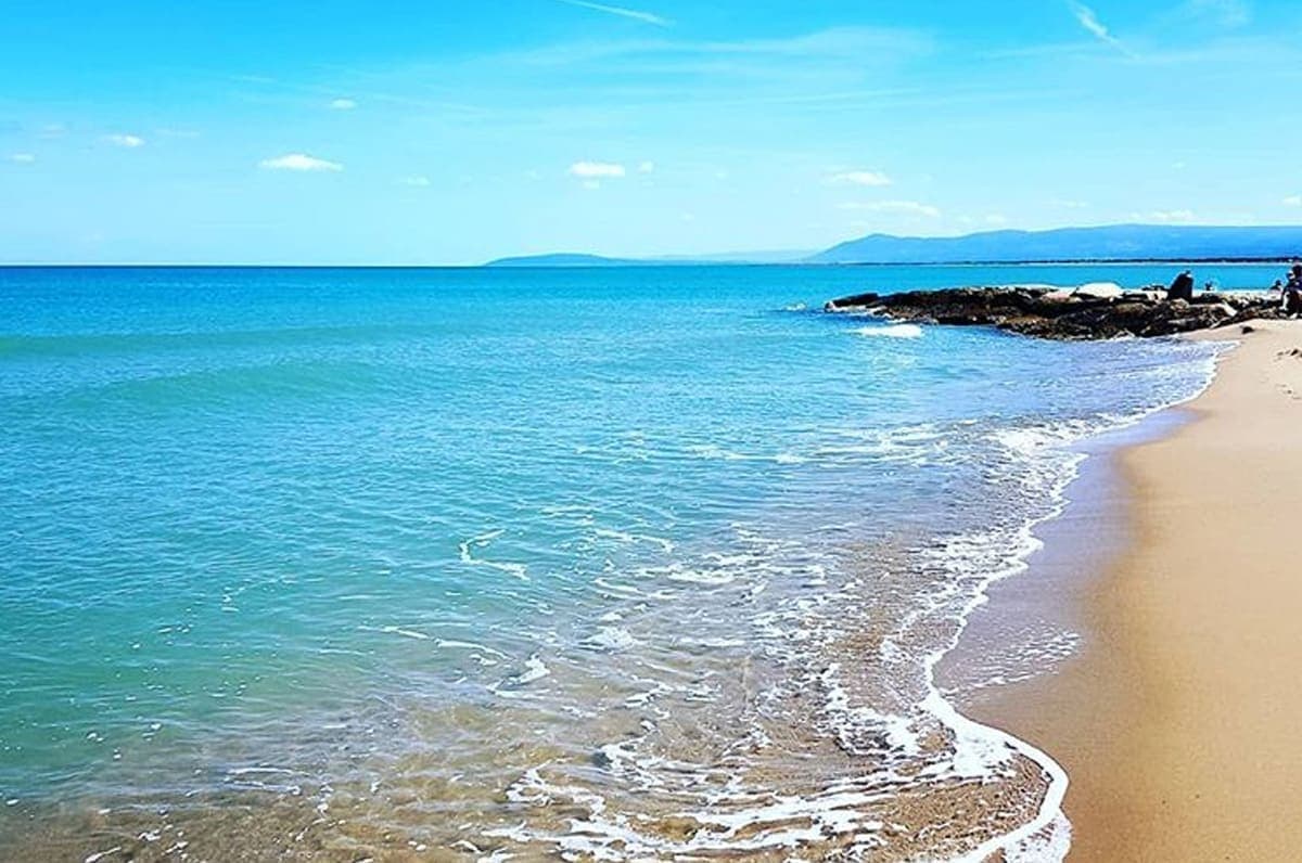Wide sandy beach at Marina di Lesina